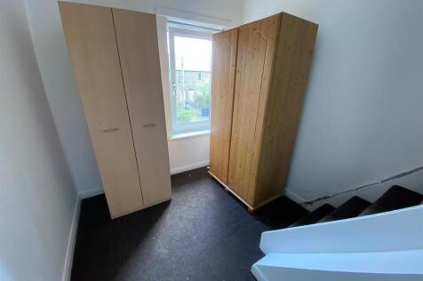 study with staircase to attic.jpg