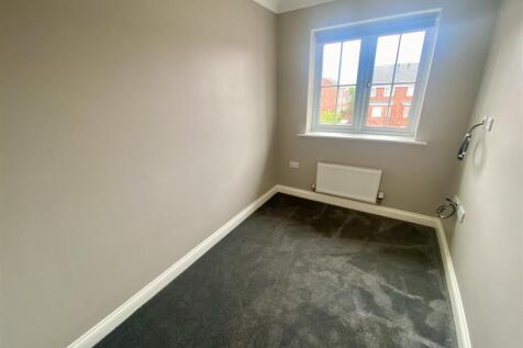 SMALL BEDROOM.jpeg