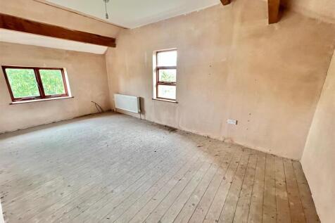 Bramleys Estate Agents - Quarmby Road - Building a