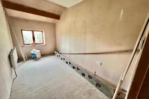 Bramleys Estate Agents - Quarmby Road - Building a