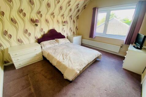 bedroom first floor with eaves access.jpg