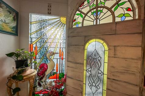 ALTERNATE VIEW OF RECEPTION HALLWAY