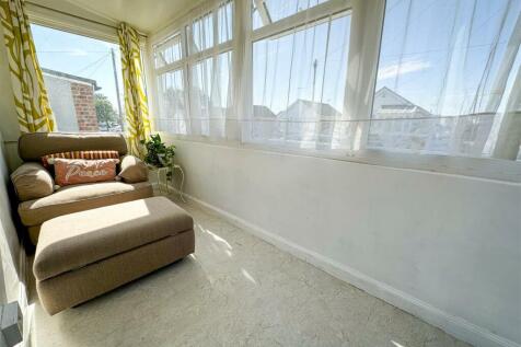 ENTRANCE PORCH/FRONT SUN LOUNGE