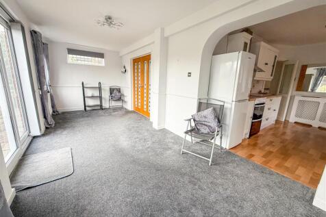 ALTERNATE VIEW OF SITTING/DINING ROOM