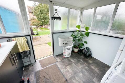SUN LOUNGE/UTILITY ROOM