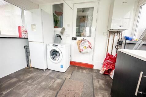 SUN LOUNGE/UTILITY ROOM