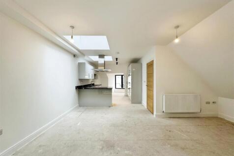 Living area to kitchen