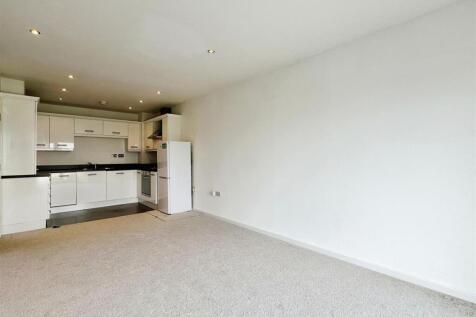 Living area to kitchen