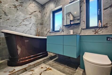 Slipper Bath &amp; Corian Vanity