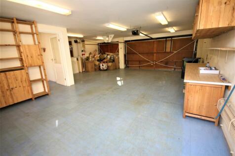 INTERIOR OF TRIPLE GARAGE WITH OWN DRIVE: PIC. 1