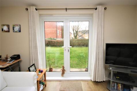 FRENCH DOORS TO COMMUNAL GARDENS:
