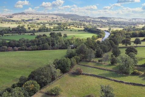 Elevated view of field and surrounding countryside