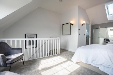 With high ceilings and an open staircase