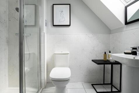 En-suite shower room away from the family