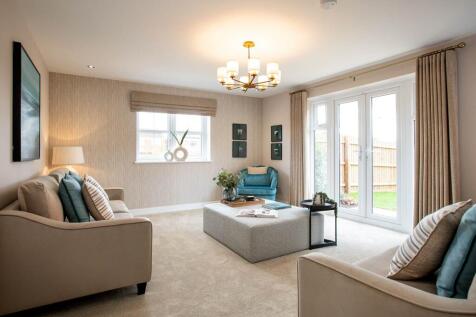 French doors opening out to the patio and garden