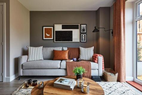 The open plan living/dining area is light and spacious