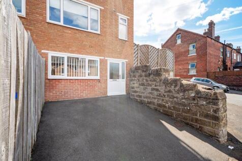 Rear Entrance / Driveway 
