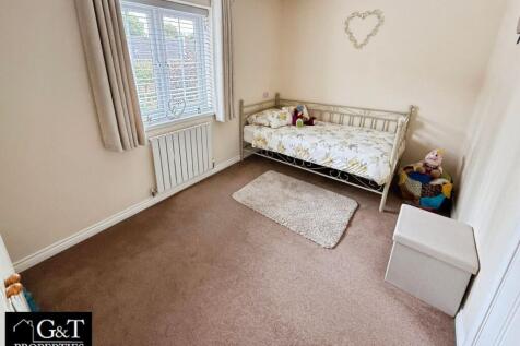 SECOND BEDROOM
