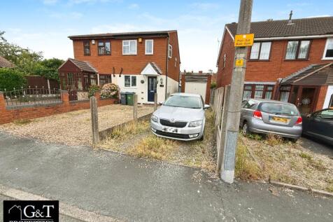 REAR DRIVEWAY/GARAGE
