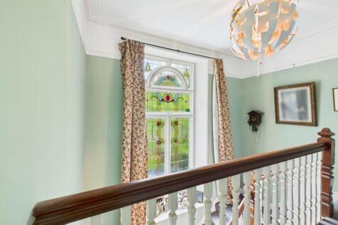 landing and stained glass window