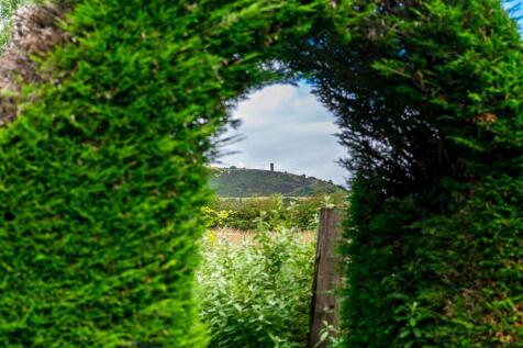 Garden through to Land with Holcombe Hill View