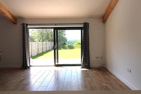 Hilltop living room patio door view.jpg