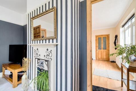 Sitting Room into Entrance Hallway