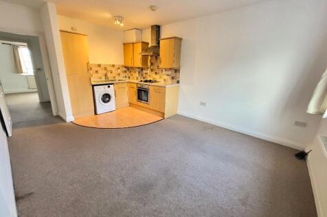 to Kitchen Area...
