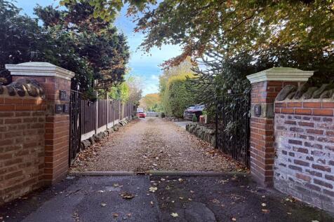 Gated Entrance to De