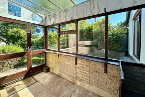 Rear Sun Porch Towards Patio.JPG