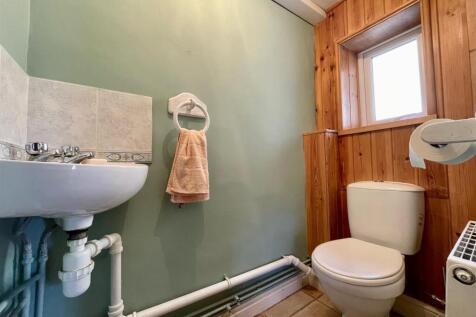 E. CLOAKROOM website.jpg