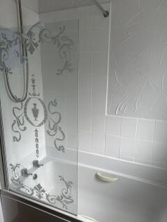 Electric shower over bath