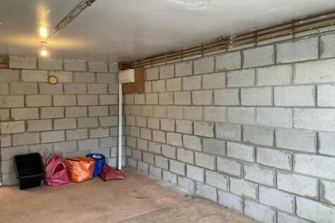 large garage/WC, adjoining Kitchen