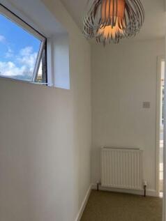 radiators evenly spaced ax rooms/ house