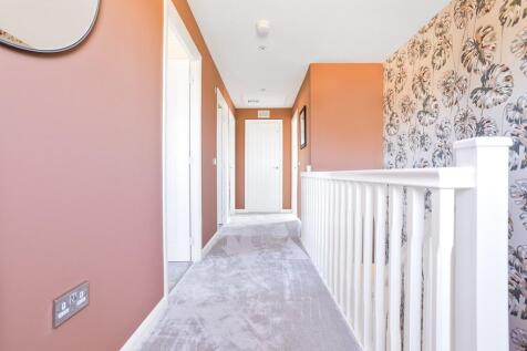 Spacious and bright landing flooded with natural light