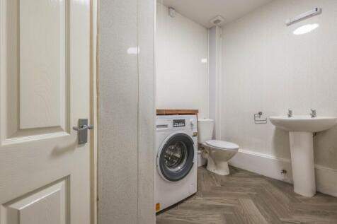 DOWNSTAIRS W.C./UTILITY