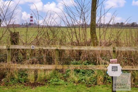 Caravan Pitch Toward The Lighthouse