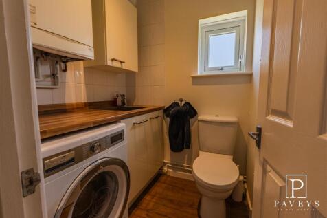 CLOAKROOM/UTILITY ROOM