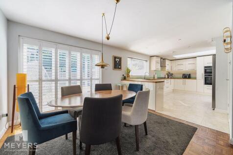 Dining Area into Kitchen 