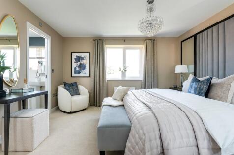 King size bedroom with ample space and en suite shower room