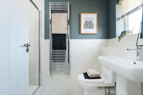 The main bedroom benefits from an en suite shower room