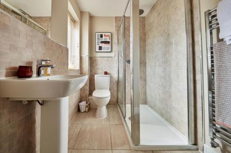 An en suite shower room away from the family