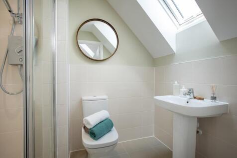 The master bedroom benefits from an en suite shower room