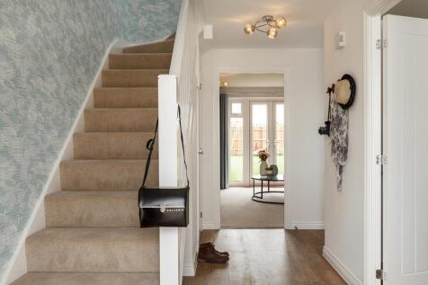 The Chelbury has a spacious hallway with under stair storage