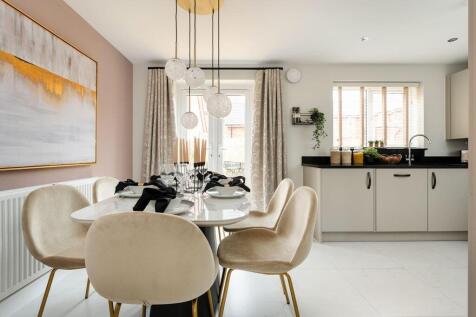 French doors lead out to the garden from the dining area