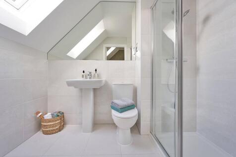 The main bedroom also features a private en-suite shower room
