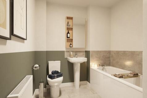 A practical family bathroom is found on the first floor