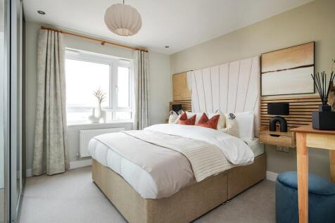 A spacious main bedroom is the perfect place to unwind away from the rest of the home