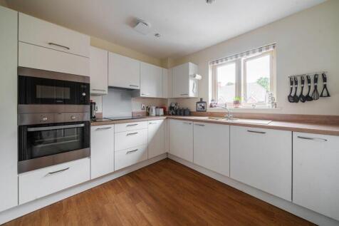 Kitchen with built-in appliances