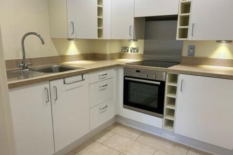 Kitchen with built-in appliances